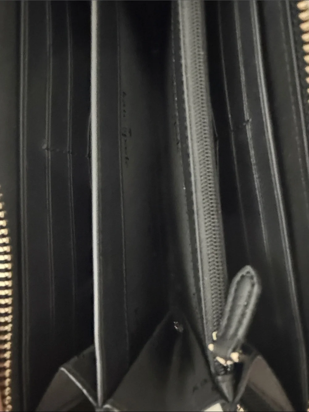 kate spade Black Pebbled Leather Zip Wallet with Gold Logo